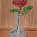 eine Rose in der Wasserflasche